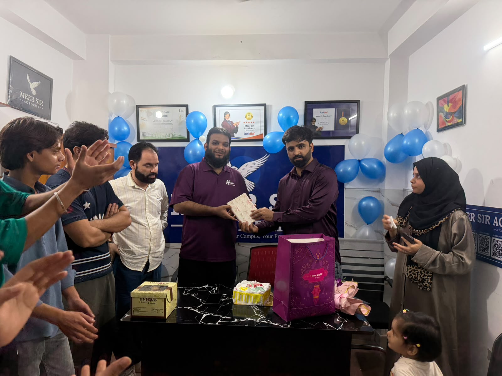 An academy gathering with students and educators